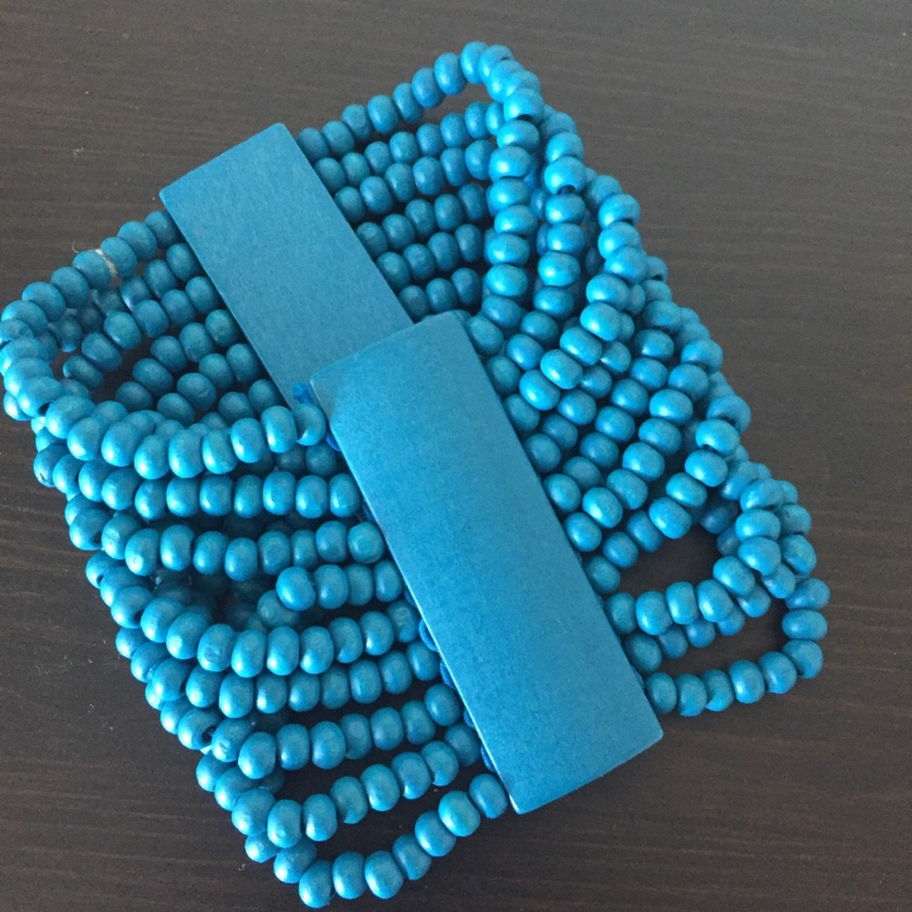 Turquoise-colored wooden beaded bracelet